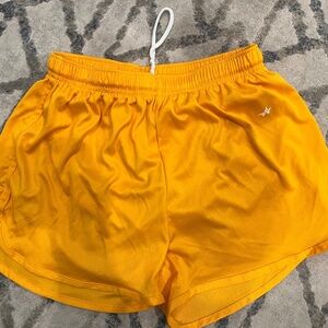Alleson athletic shorts, gold color